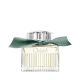 Chloé Rose Naturelle Intense perfume bottle with a green ribbon.