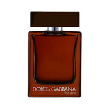 Dolce & Gabbana The One for Men Parfum bottle with brown cap and amber liquid.