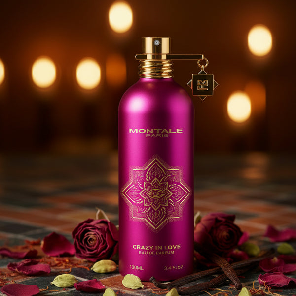 A pink Montale Crazy In Love perfume bottle with gold accents.