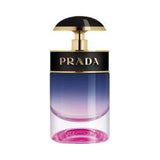 Prada Candy Night perfume bottle with a gradient blue and pink glass and a black and gold cap.